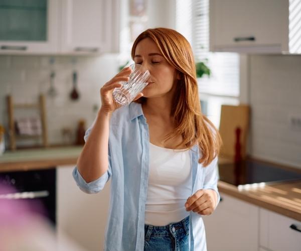 Drinking filtered water from the kitchen tap